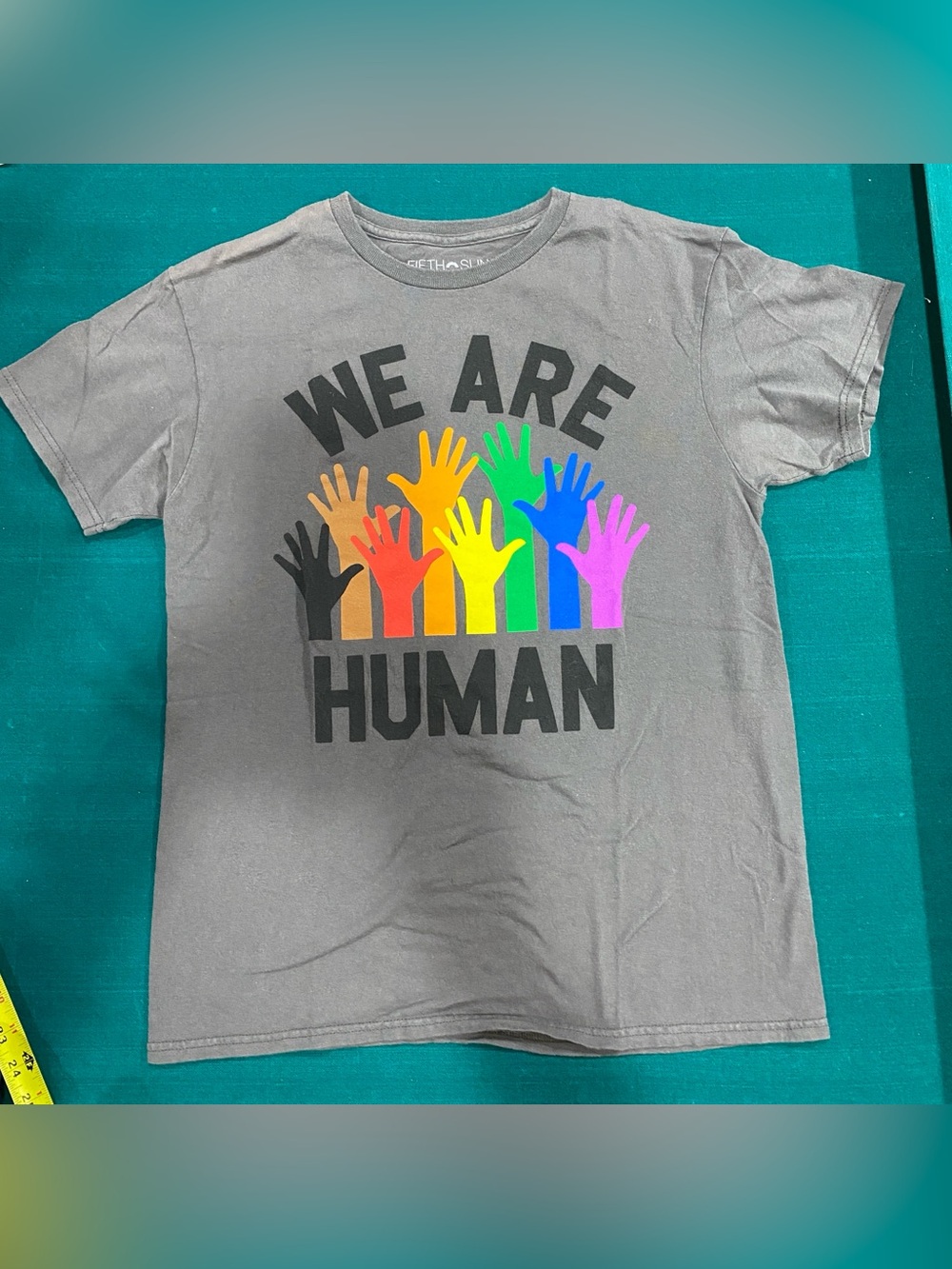Graphic Tee in gray with Rainbow Hands "We Are Human" Size M